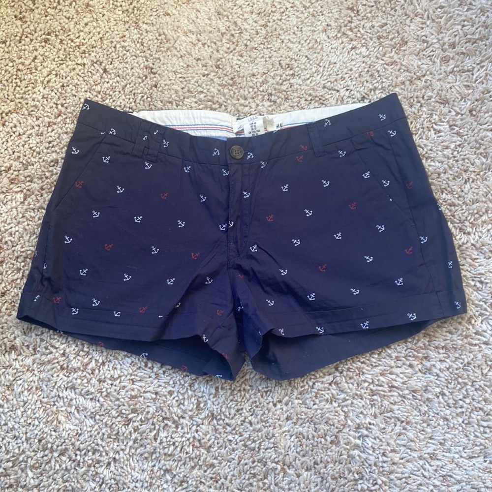 Navy blue chino shorts with anchor pattern